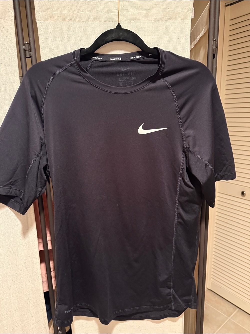 Nike Black Athletic Short Sleeve Shirt with White Swoosh
